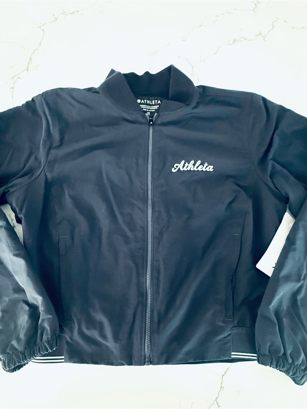 Athleta dark navy Bomber Jacket with Script Logo size XS